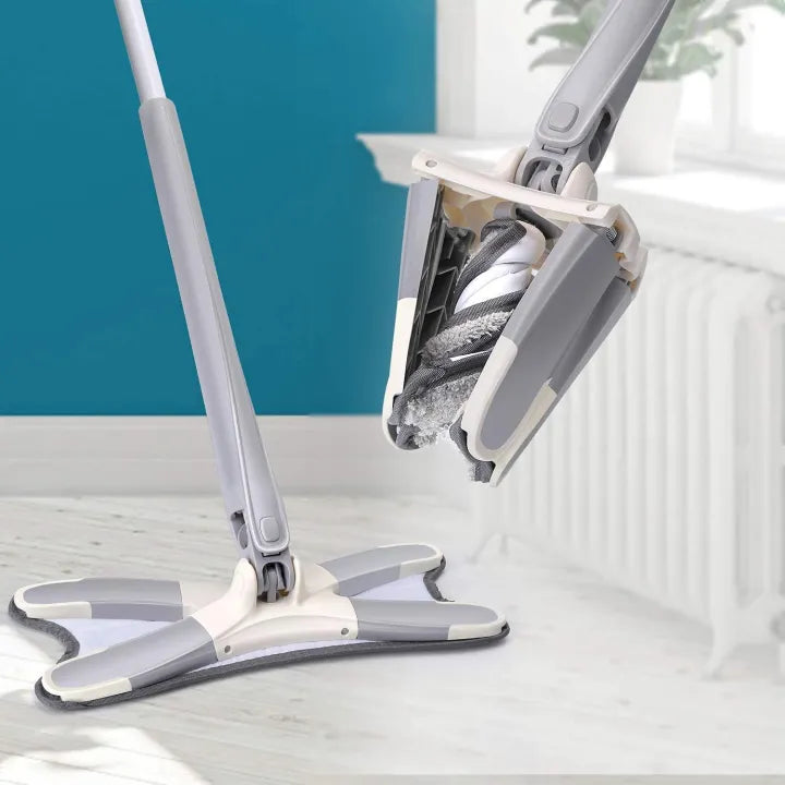 X-Type mop in use cleaning tile floor in Pakistan home