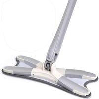 X-Type flat mop head close-up with washable microfiber pad